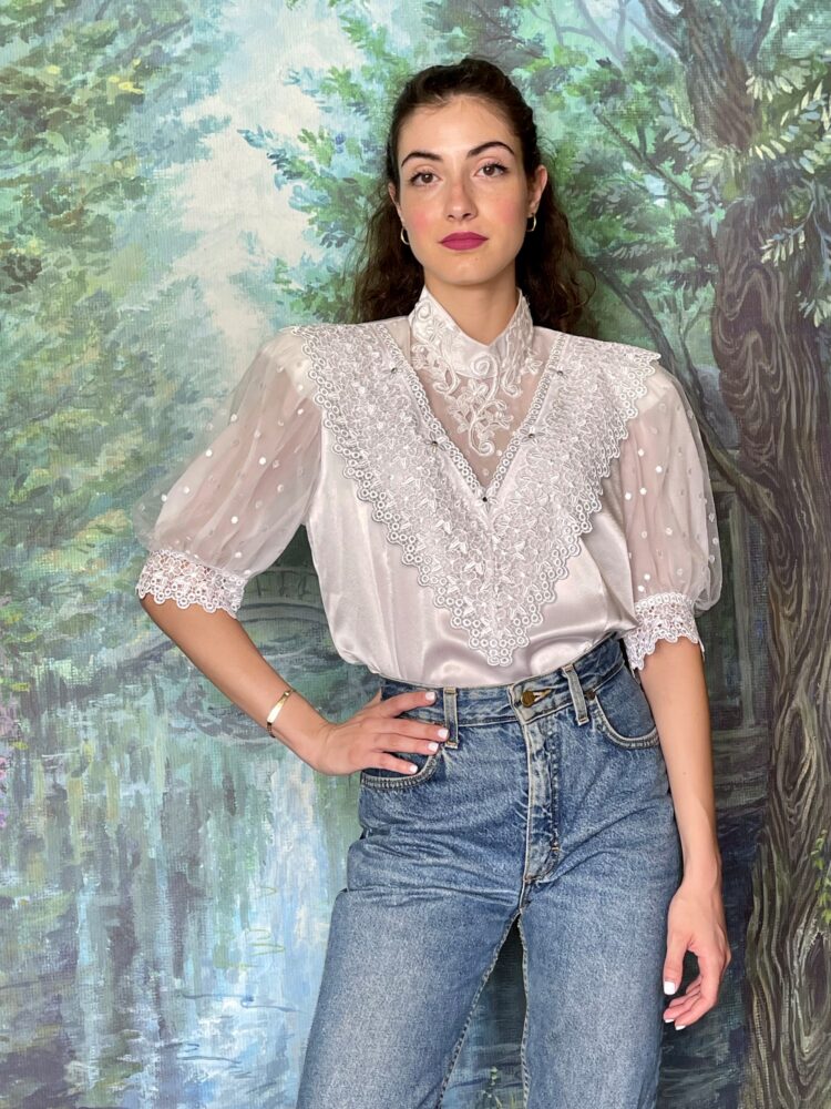 One-of-a-kind white satin blouse with lace front.
